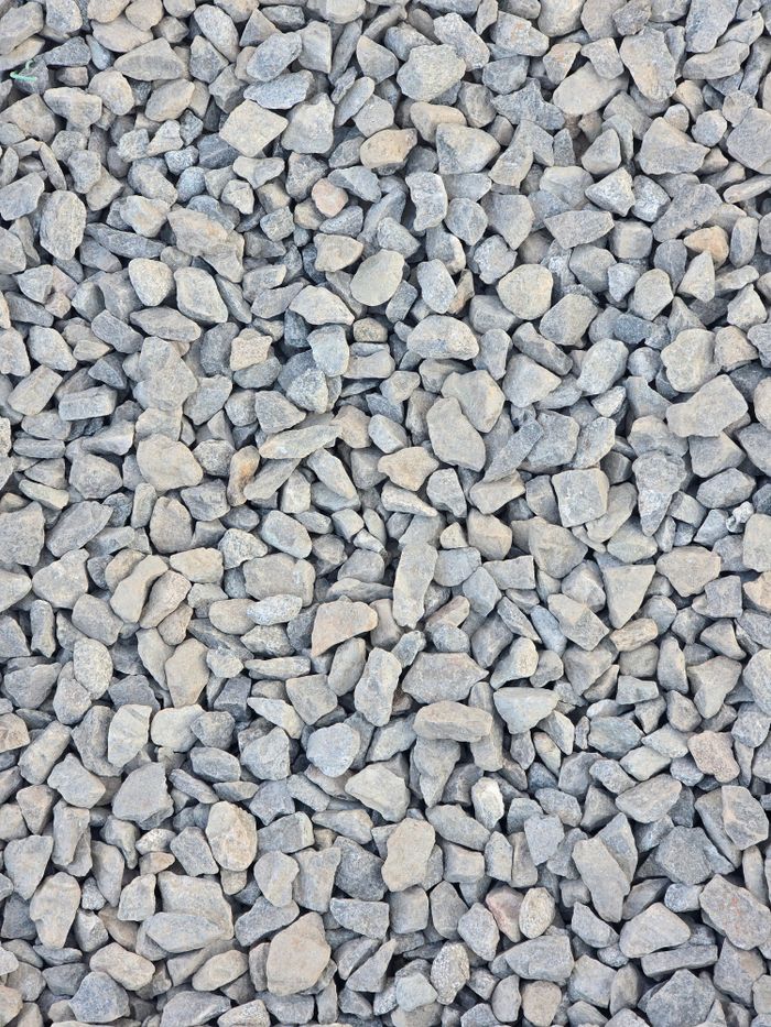 High-resolution image of gray gravel stones, ideal for textured backgrounds.